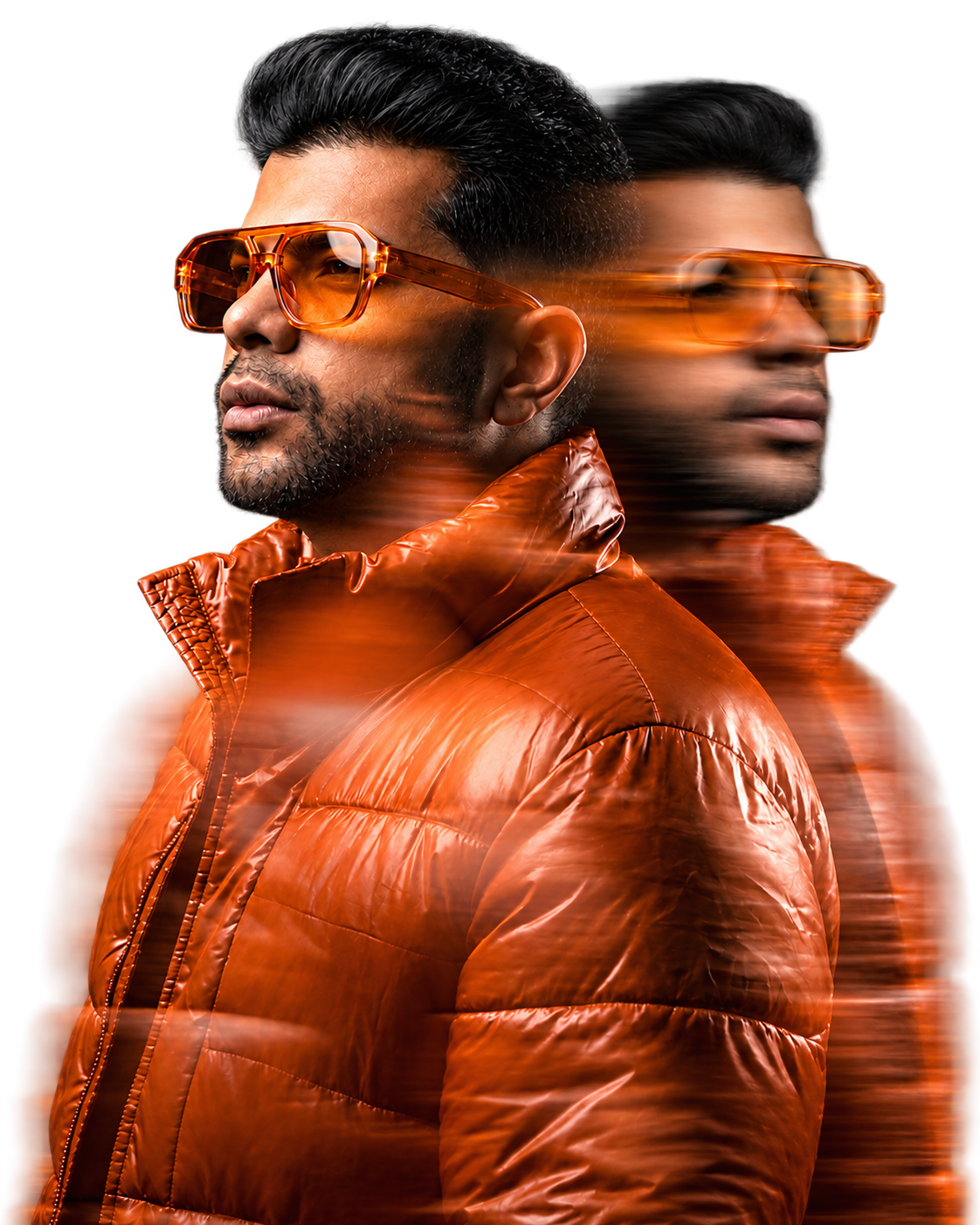 Full portrait of Adeel Bhatti wearing orange glasses and an orange jacket